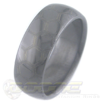 honey comb design laser engraved on black zirconium ring with black on black motif known as stealth