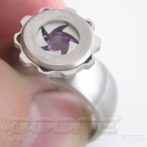 iris ring with working mechanisim which can hide  a stone or a laser engraved initial