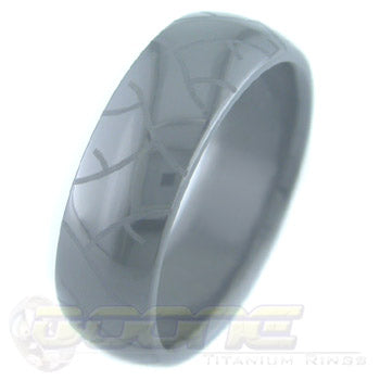 tread marks design laser engraved on black zirconium ring with black on black motif known as stealth