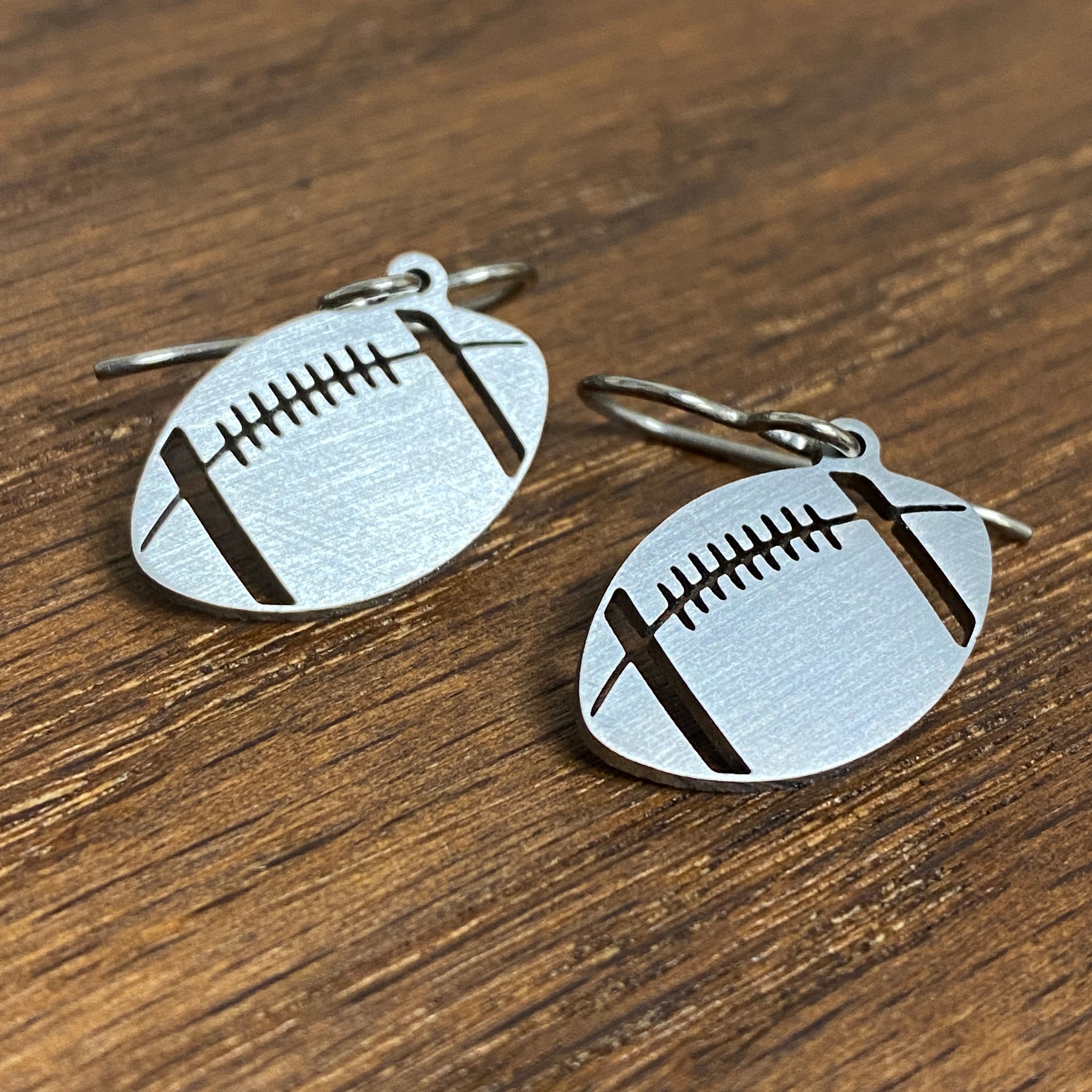 Titanium Football Earrings