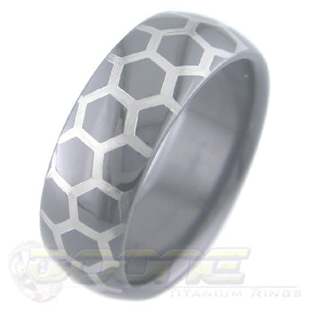 honey comb design laser engraved on black zirconium ring with white on black motif known as tuxedo