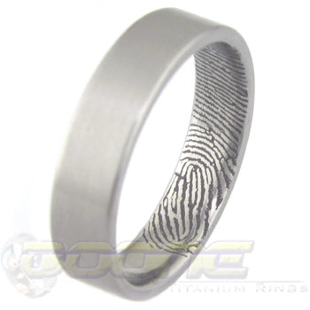 custom fingerprint laser engraved on the inside of a titanium ring
