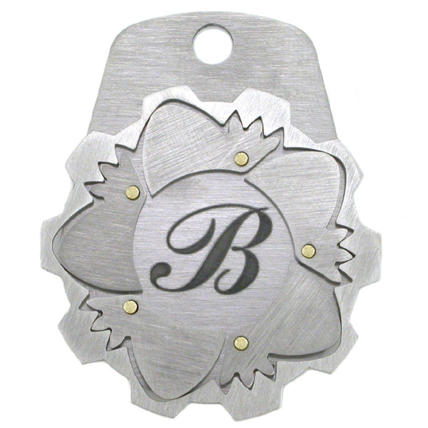 titanium iris pendant/dog tag with engraved letter on the inside