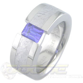 flat profile titanium classic tension set ring with emerald cut stone