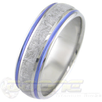 titanium ring with center inlay of meteorite and anodized color (blue is pictured) on each side of meteorite