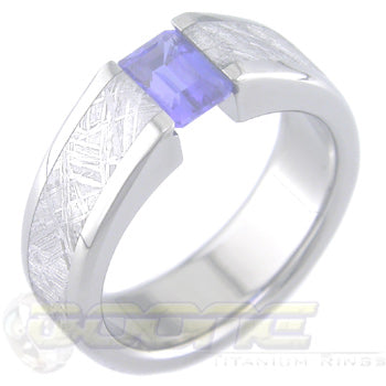 titanium flat Venus tension set ring with meteorite inlay and a square Emerald cut stone