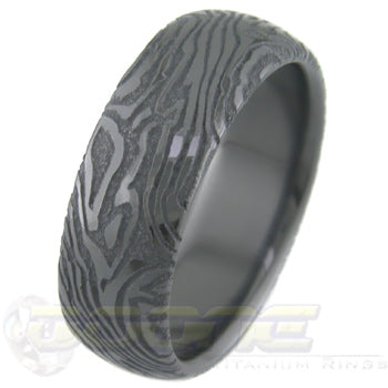 mokume gane design laser engraved (mokulaze) into black zirconium ring 