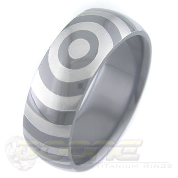 orbit design laser engraved on black zirconium ring with white on black motif known as tuxedo