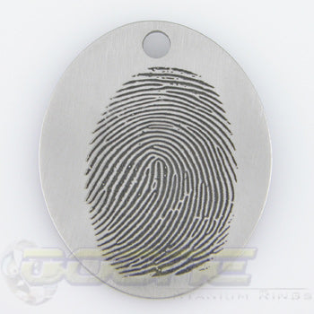 custom fingerprint laser engraved onto titanium pendant