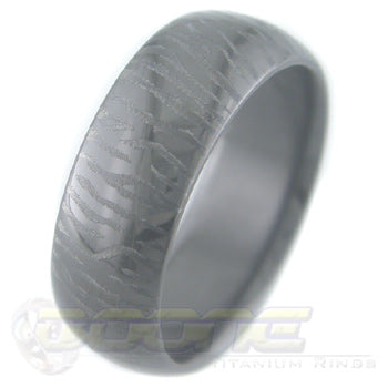 siberian tiger claw mark design laser engraved on black zirconium ring with black on black motif known as stealth