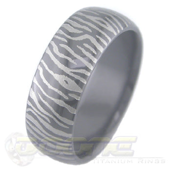 siberian tiger claw mark design laser engraved on black zirconium ring with white on black motif known as tuxedo