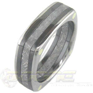 square shaped ring made from plates of titanium, black zirconium and a thick slab of meteorite