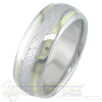 titanium ring with center inlay of meteorite and gold inlay on each side of meteorite